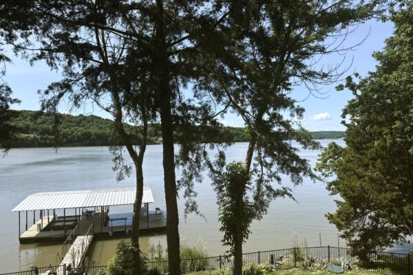 fenced yard has gate to dock